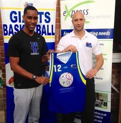 Mike Buffalo signing his first professional basketball contract
